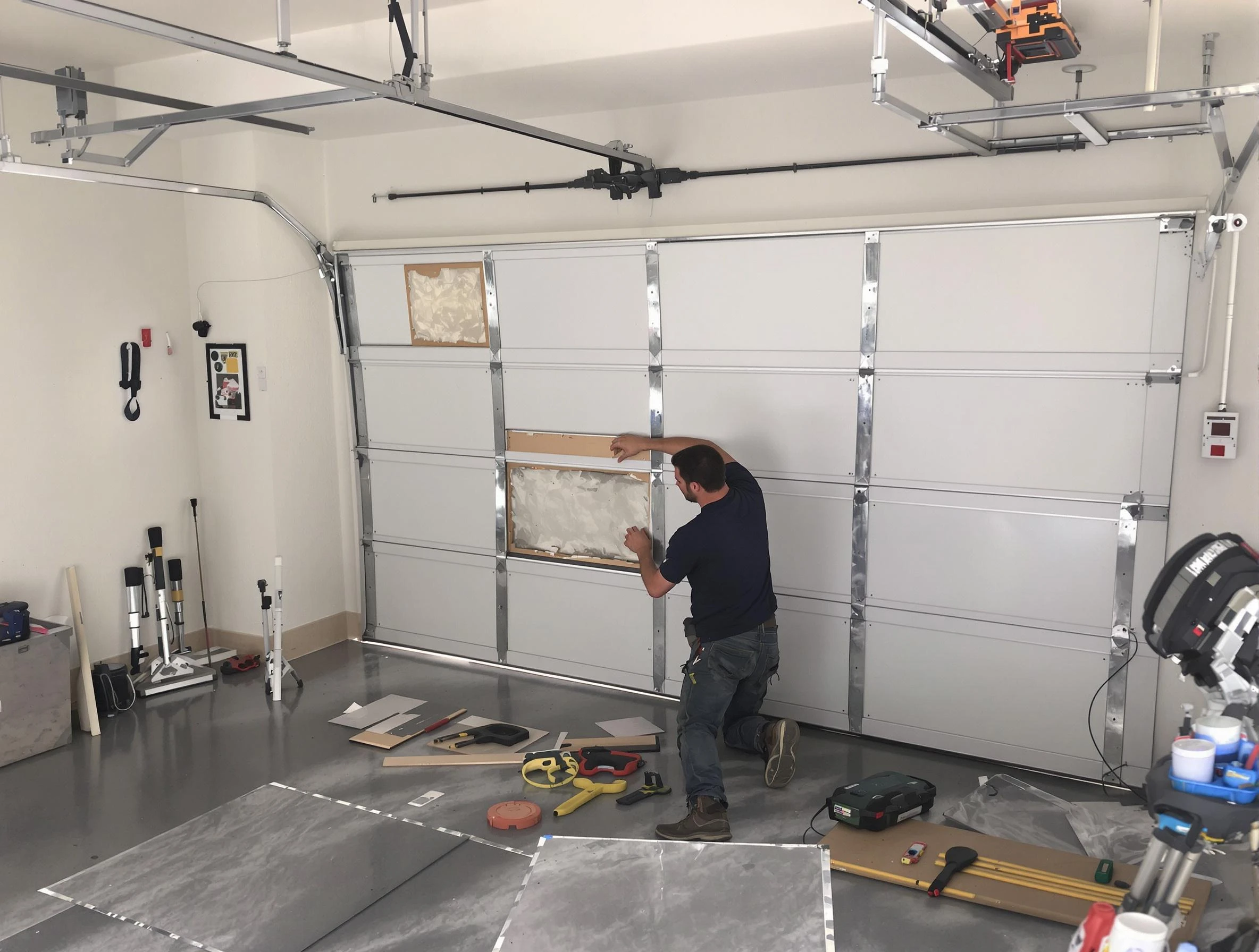 Garage Door Panel Repair in Milton